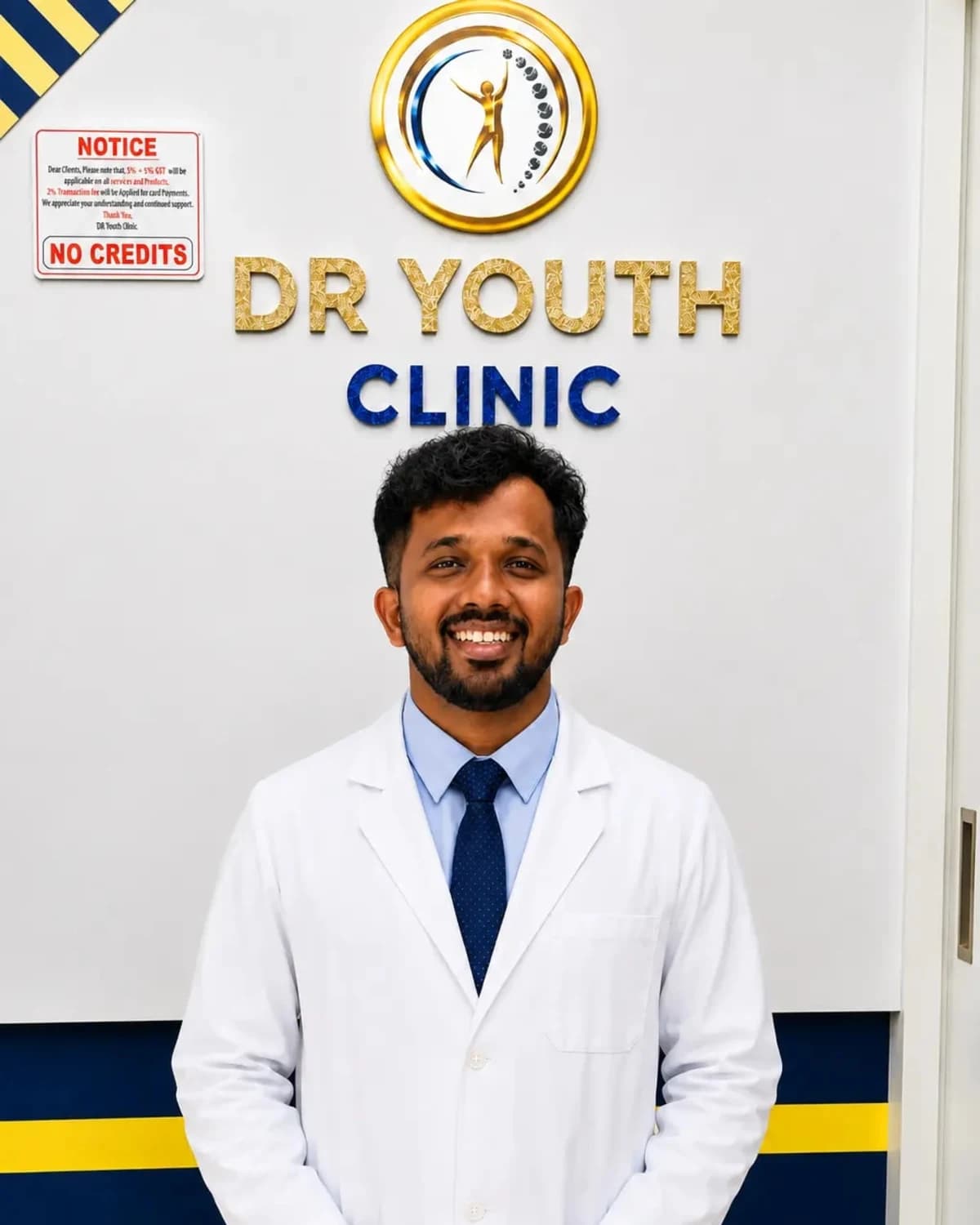 Dr. AHILAN M